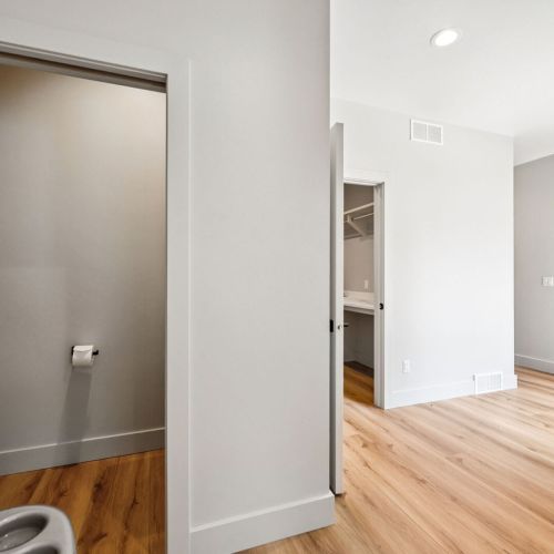 First-floor water closet off of the kitchen and garage area.