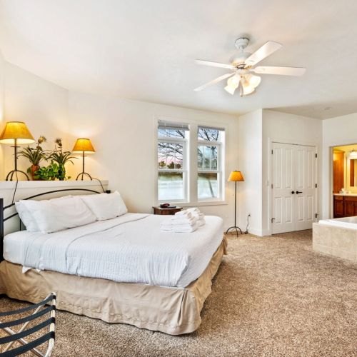 Bedroom #1 boasts a comfortable king sized and large whirlpool tub with en suite bathroom.