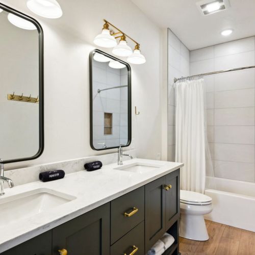 A second full bathroom with a shower/tub combo ensures there’s room for everyone to get ready comfortably.