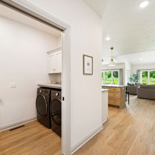 Just off the main living space is a half bath and a washer and dryer for your convenience throughout your stay.