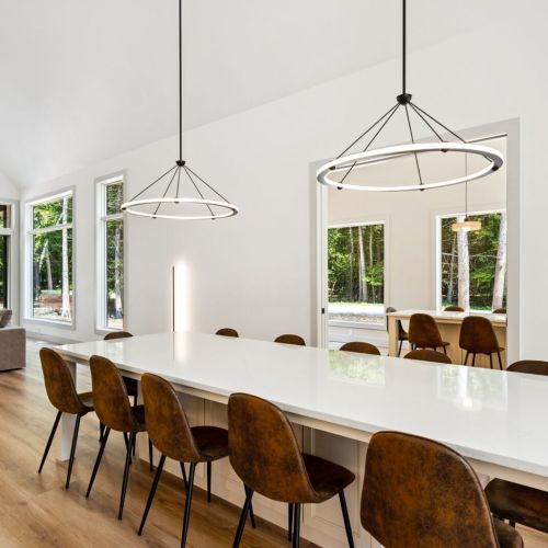 Off the main living area, you'll find a separate gathering area perfect for board games and reading. Sliding glass doors provide additional privacy.