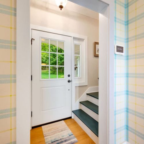 Heading back toward the front of the home, the second level reveals a private master suite.