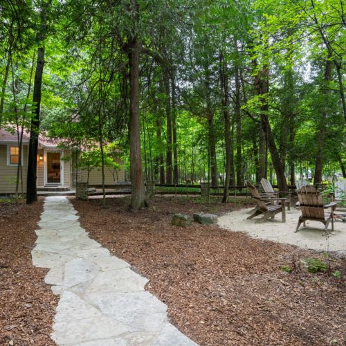 Discover a cozy woodland escape at the Woods Cabin, part of Three Leaves Bayside Retreat in Egg Harbor, Wisconsin. Perfect for small families or groups, this peaceful cabin offers comfort, privacy, and access to shared lakeside amenities-just minutes from downtown Egg Harbor.
