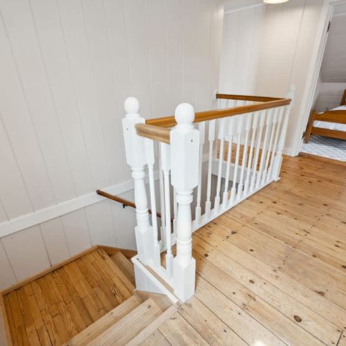 Upstairs, you'll find an additional two bedrooms and full-bathroom.