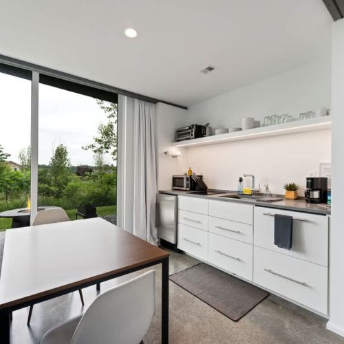 Fully stocked and smartly laid out. The efficient kitchenette includes everything you need for easy meals and late-night snacks.