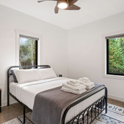 Serene and comfortable, this space provides everything you need to unwind and enjoy a restful night’s sleep after a day of exploring. Queen Bedroom #1