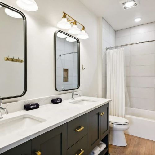 A second full bathroom with a shower/tub combo ensures there’s room for everyone to get ready comfortably.
