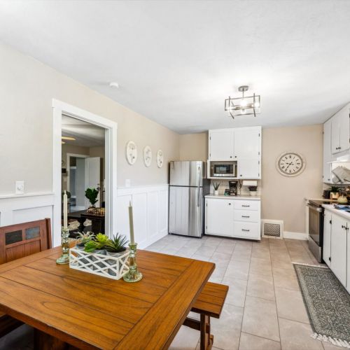 Enjoy meals in the bright and spacious kitchen, equipped with modern appliances and a cozy dining nook. The tasteful decor and ample counter space make it perfect for both cooking and gathering.