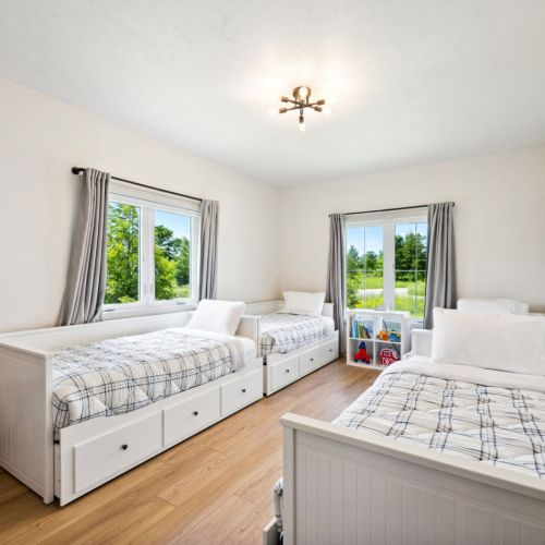 The third bedroom offers four twin beds-perfect for kids, cousins, or friends to unwind together.