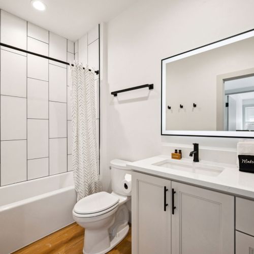 Shared Full-Bathroom #6 with tub and shower combo.