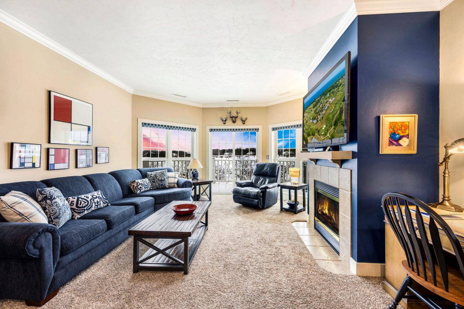 Relax in cozy comfort with an indoor fireplace and sleeper sofa for additional guests. Enjoy views of the grounds and outdoor seating on your own private deck/patio.