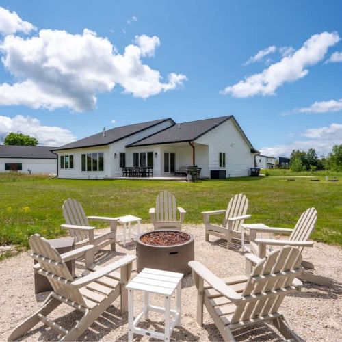 Welcome to Orchard View Retreat, a newly built modern 3 bedroom/2.5 bathroom farmhouse tucked along the edge of The Orchards Golf Course in Egg Harbor.