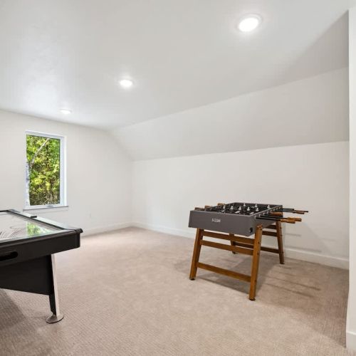 Head upstairs to the loft for a game of foosball or air hockey. The perfect flex space for kids or groups.