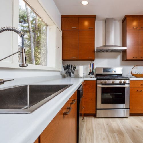 The kitchen has been entirely renovated with custom cabinets and stainless steel appliances.  it's stocked with everything you'll need for meal preparation during your stay.