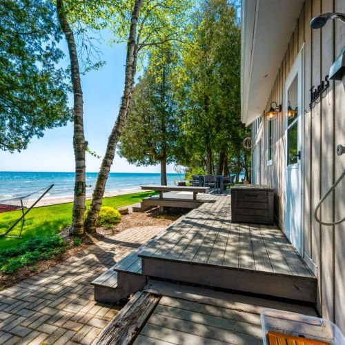 Revel in the scenic views from the comfort of your spacious porch, and let the rhythmic sounds of the waves be your natural soundtrack to relaxation.