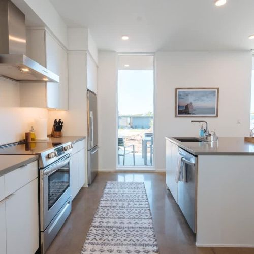 Your kitchen is equipped with everything you need to prepare a meal for your group, with quartz counter tops and breakfast bar seating for 6.