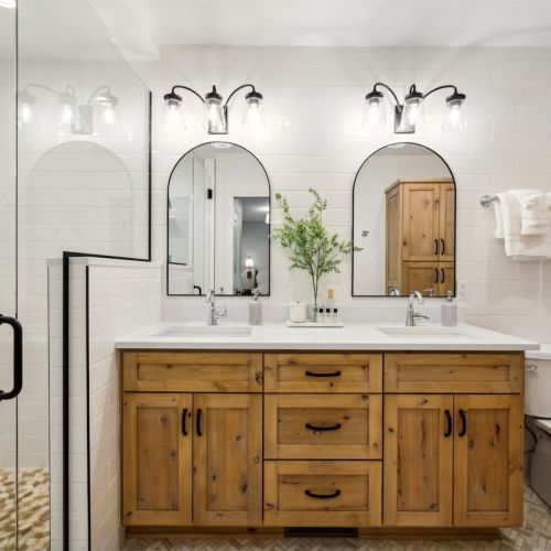 Start your day in luxury in our new main floor ensuite bath with dual sinks and walk-in tiled shower.