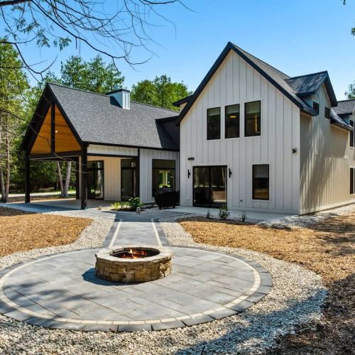 With a spacious patio, fire pit, EV charger, and elevated finishes throughout, Point Beach offers comfort, connection, and relaxation in the heart of Door County.