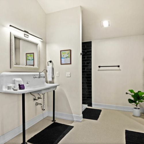 The lower level bathroom features a shower and old-style farmhouse sink.  All of the plush towels you need for your stay will be provided.