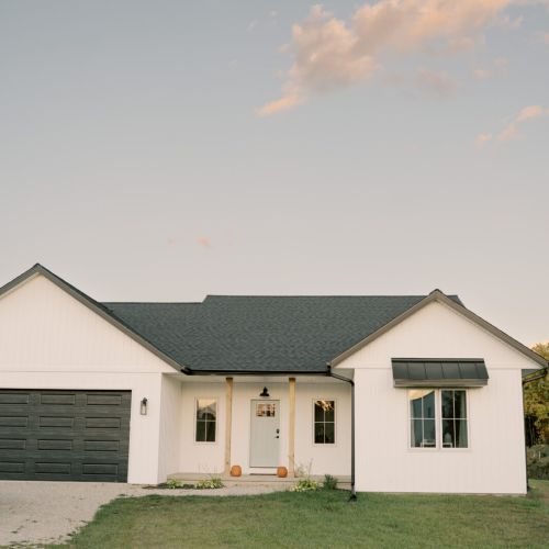 Overlooking rows of apple trees and open countryside, this serene escape blends upscale comfort with relaxed Door County charm.