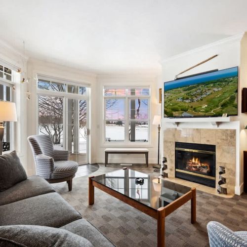 Relax in cozy comfort with an indoor fireplace and sleeper sofa for additional guests. Enjoy views of the grounds and outdoor seating on your own private deck/patio.