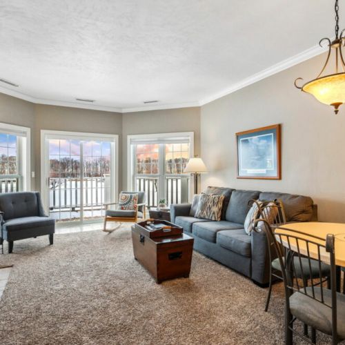 Relax in cozy comfort with an indoor fireplace and sleeper sofa for additional guests. Enjoy views of the grounds and outdoor seating on your own private deck/patio.