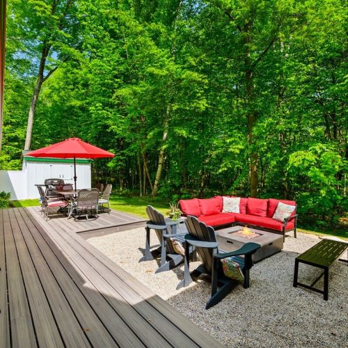 Enjoy and dine in the outdoor space nestled beside a scenic woods.