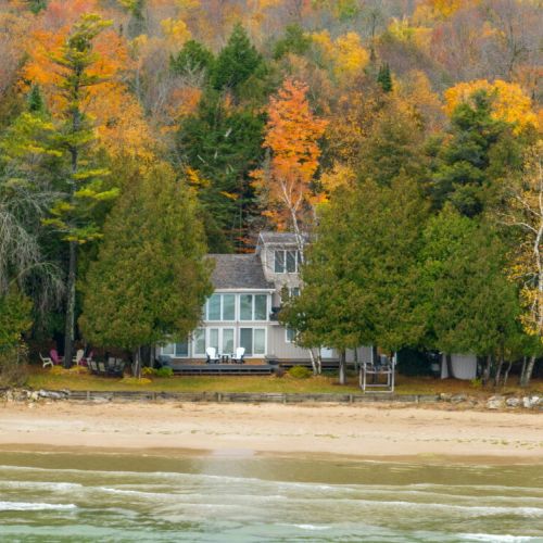 Experience the enchantment of Door County. Sandvik House is a charming 4-bed, 2-bath cottage nestled along the tranquil shores of Lake Michigan. This home offers a private sandy beachfront for memorable days under the sun.
