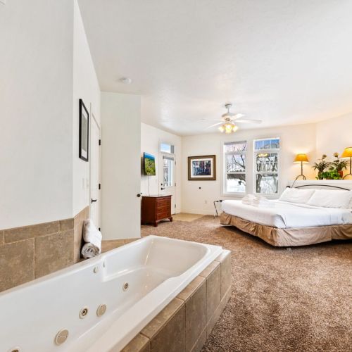 Bedroom #1 boasts a comfortable king sized and large whirlpool tub with en suite bathroom.