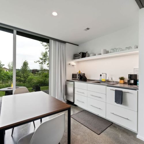 Fully stocked and smartly laid out. The efficient kitchenette includes everything you need for easy meals and late-night snacks.