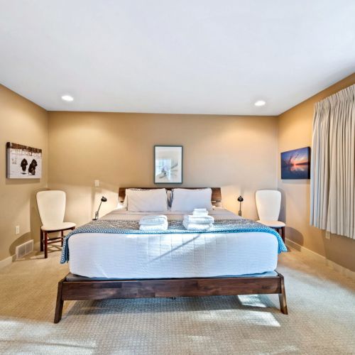 The Master Suite features a plush king bed and ample space to relax after a day of exploring the peninsula.