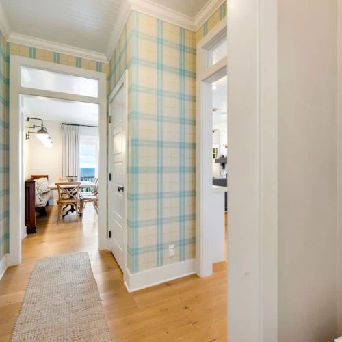 Classic interiors with oak floors and bead board ceilings create a warm and welcoming feel, while modern updates provide comfort and ease.