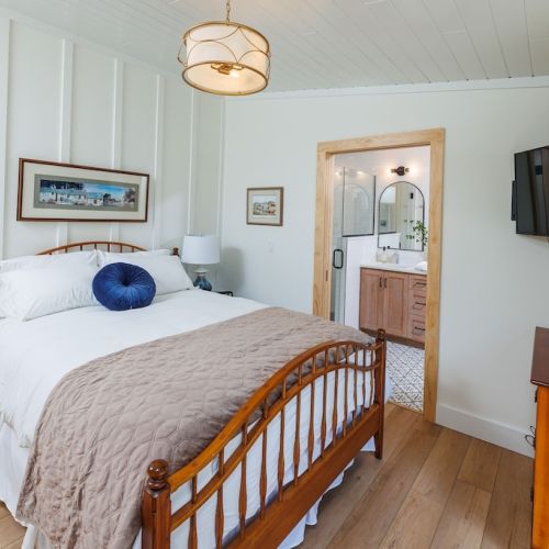 The primary, lakeside bedroom has a queen bed and ensuite bath.