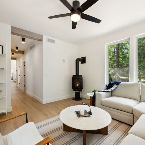 Gather ‘round the modern wood stove, dive into a board game from the shelf, or kick back with a book-this space was made for connection.