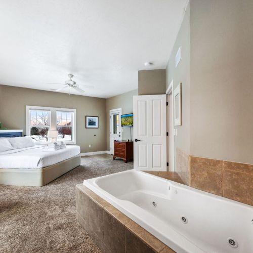 Bedroom #1 boasts a comfortable king sized and large whirlpool tub with en suite bathroom.