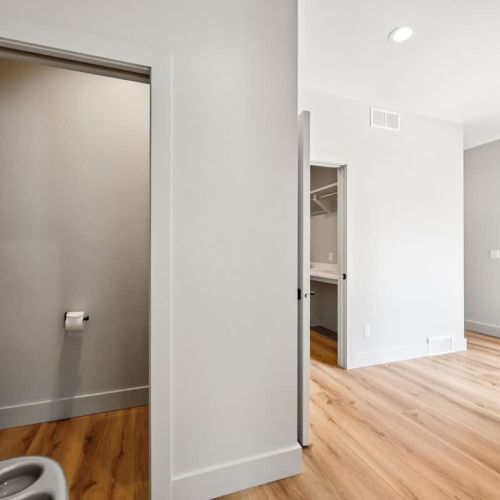 First-floor water closet off of the kitchen and garage area.