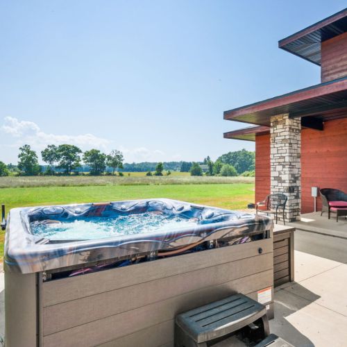 This luxury Door County retreat features a private hot tub and is located in a certified dark sky region-perfect for stargazing. On clear nights, you might even catch the northern lights or a meteor shower.