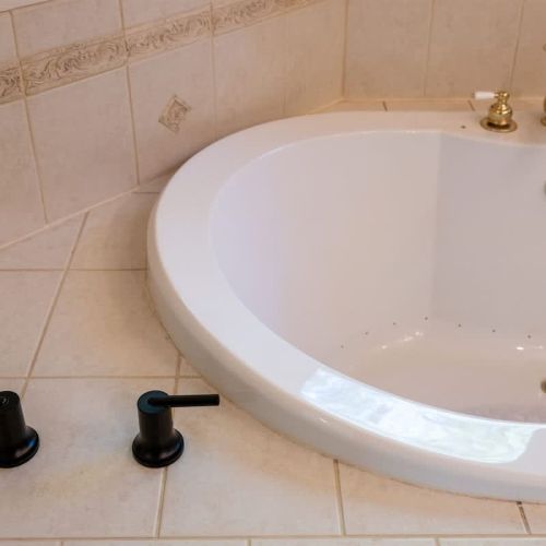 Take a page out of the book of luxury by enjoying a bubble bath in our jacuzzi tub.