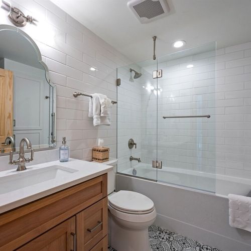 The hall bath is remodeled and has a tub/shower combination.