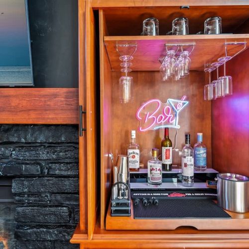 Make a cocktail while enjoying good conversation at our built-in bar.