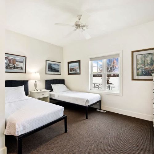 Bedroom #2 features two twin beds and an en suite bathroom.