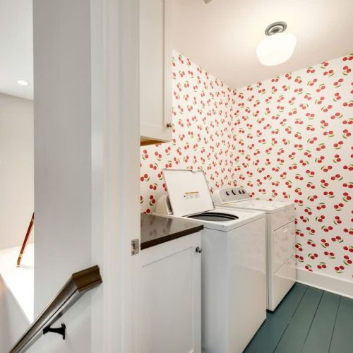 Also on the second floor, a laundry area is available for convenience during guest's stay.