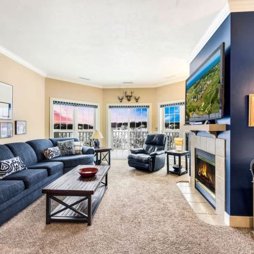 Relax in cozy comfort with an indoor fireplace and sleeper sofa for additional guests. Enjoy views of the grounds and outdoor seating on your own private deck/patio.