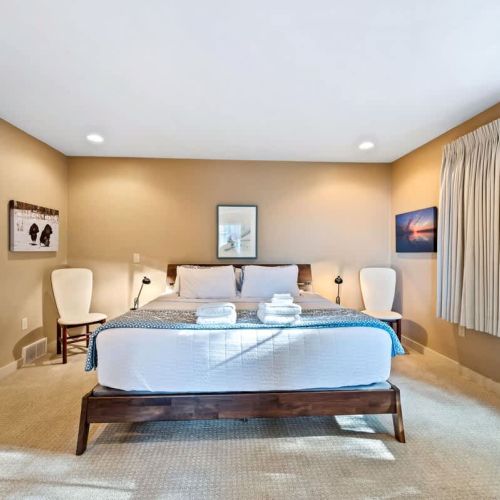 The Master Suite features a plush king bed and ample space to relax after a day of exploring the peninsula.