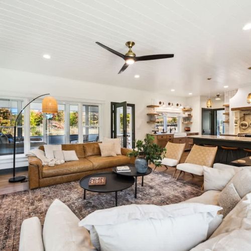 The open-concept living area invites you to relax in front of the gas hearth fireplace, with high-speed WiFi and Smart TVs available throughout the home for your entertainment.