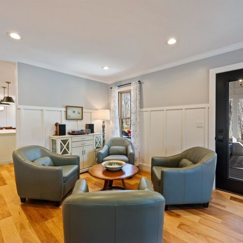 The entry to the screen porch is directly off of the front room for easy indoor-outdoor living.