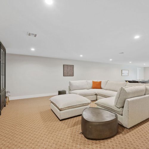 Grab the popcorn and enjoy epic movie nights with family and friends in this cozy, dedicated entertainment space.