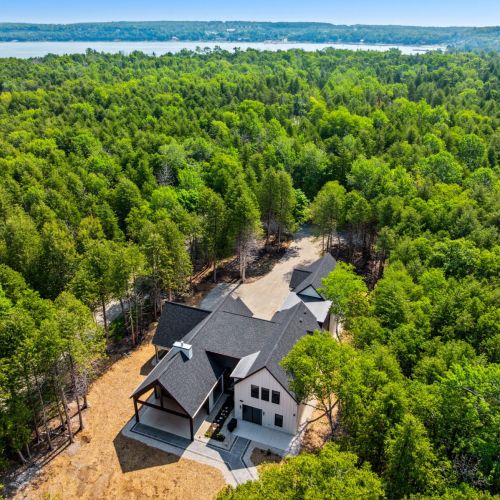 Located in the sought-after community of Egg Harbor, Point Beach offers convenient access to local beaches, shops, restaurants, wineries, and hiking trails.