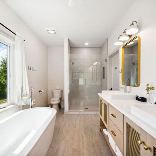 The spa-like master bath features a relaxing large soaker tub and walk-in shower.