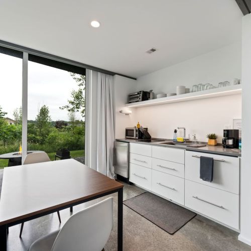 Fully stocked and smartly laid out. The efficient kitchenette includes everything you need for easy meals and late-night snacks.